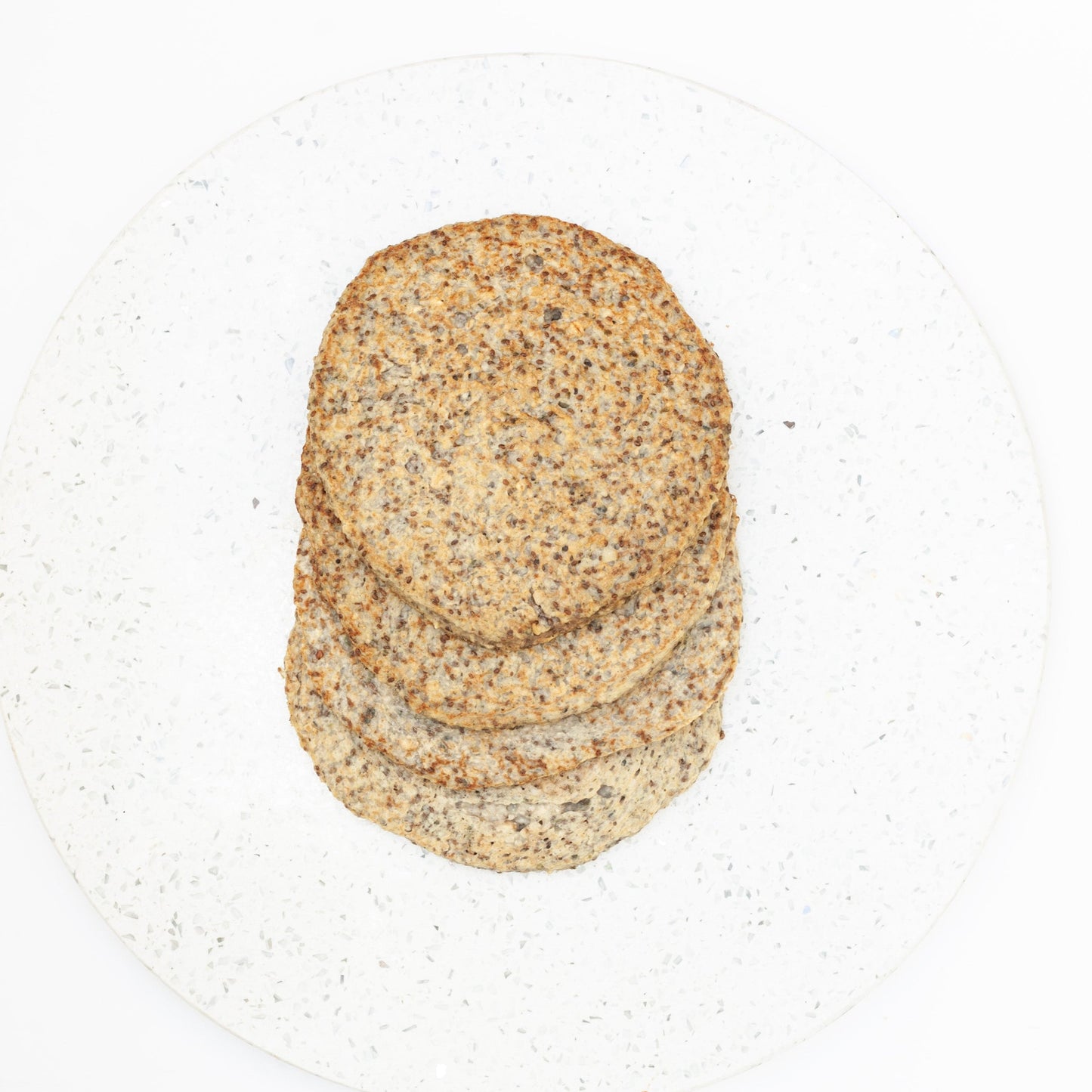 Four vegan protein flapjacks white background